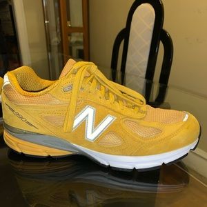 Yellow 990 New Balance sneakers